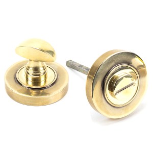 FROM THE ANVILĀ® Aged Brass Round Thumbturn Set (Plain)