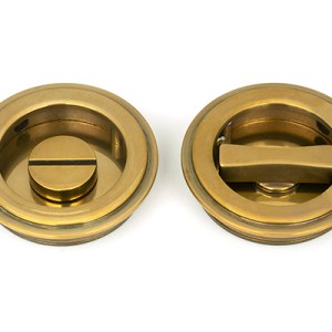 FROM THE ANVILĀ® Aged Brass 60mm Art Deco Round Pull - Privacy Set