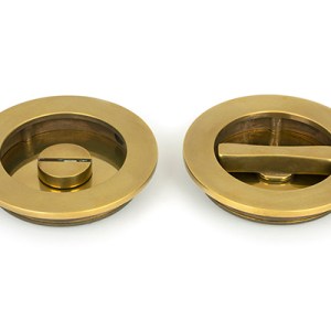 FROM THE ANVILĀ® Aged Brass 75mm Art Deco Round Pull - Privacy Set