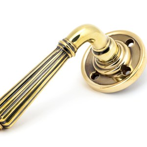 FROM THE ANVILĀ® Aged Brass Hinton Lever on Rose Set - Unsprung