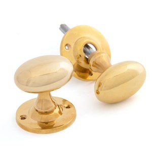 FROM THE ANVILĀ® Polished Brass Oval Mortice/Rim Knob Set