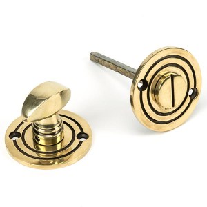 FROM THE ANVILĀ® Aged Brass Round Bathroom Thumbturn